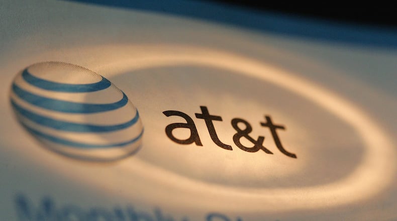 An AT&T spokesman confirmed plans to move jobs from Atlanta to LA and Dallas but declined to give details. (Photo Illustration by Tim Boyle/Getty Images)