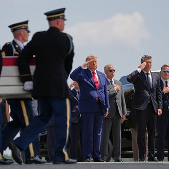 President Donald Trump and Secretary of Defense Pete Hegseth, salute as a U.S. Army carry team moves a transfer case containing the remains of Pvt. Isabella Gonzales of Carrollton, Texas, Wednesday, July 22, 2026, at Dover Air Force Base, Del. (AP Photo/Matt Rourke)