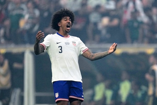United States defender Chris Richards celebrates after scoring against Mexico in the first half of the CONCACAF Gold Cup final soccer match in Houston, Sunday, July 6, 2025. (AP Photo/David J. Phillip)