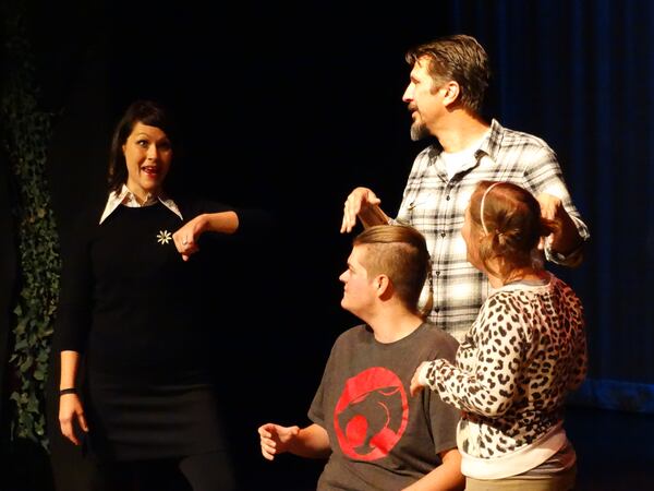 Amber Nash (left) with Lucky Yates (top right), Karen Cassady (bottom right) and audience member Thomas Hougham (seated) on November 14, 2015 at Dad's Garage TheatreSports show at 7 Stages. CREDIT: Rodney Ho/rho@ajc.com