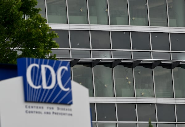 Bullet holes are visible in a CDC building on Saturday, Aug. 9, 2025, after a deadly shooting.(Hyosub Shin/AJC)
