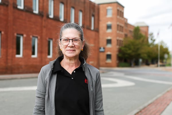 Amber Todd, 55, in downtown Rome, Ga., on Thursday, October 9, 2025. 14th Congressional District voters talked about if they are sticking with Rep. Marjorie Taylor Greene even as she's broken with her party on key issues, like Israel, Epstein and the ACA. (Abbey Cutrer/AJC)