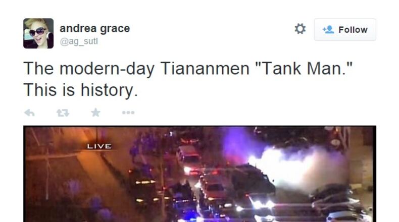 A photo taken Monday night in Ferguson, Mo., has drawn comparisons to the 1989 protests in China's Tiananmen Square.