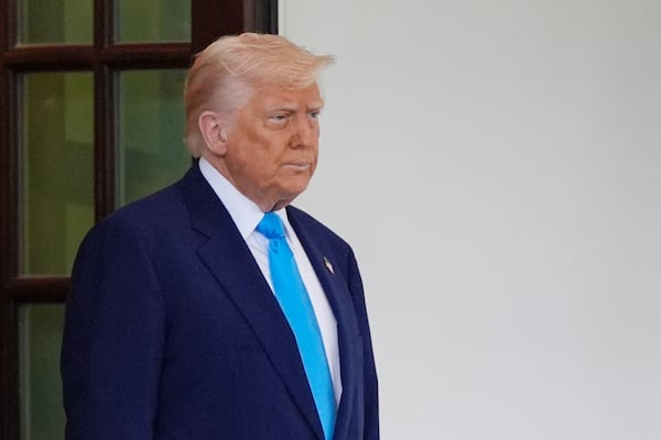 President Donald Trump waits to greet South African President Cyril Ramaphosa at the White House, Wednesday, May 21, 2025, in Washington. (AP Photo/Julia Demaree Nikhinson)
