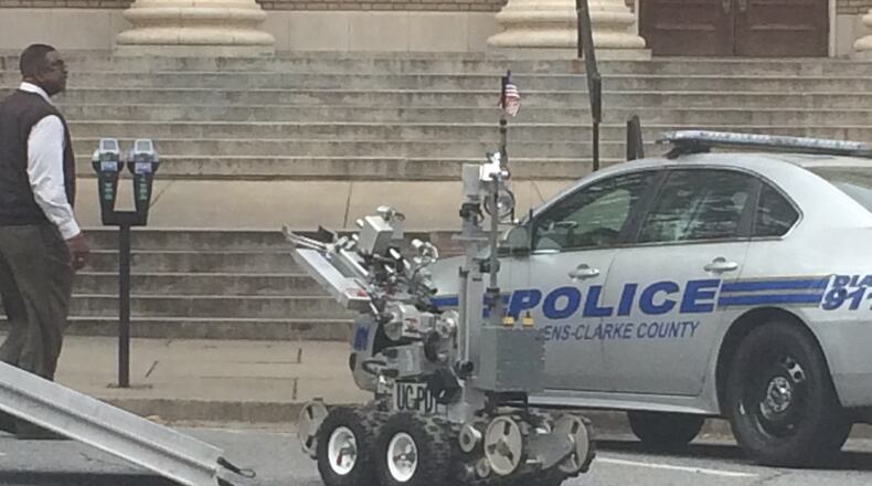 Police on the scene at the Athens-Clarke Count Courthouse, where a bomb threat was called in shortly before 3 p.m. TAYLOR CARPENTER / taylor.carpenter@ajc.com