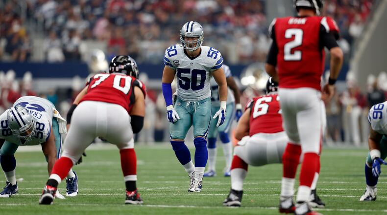Dallas Cowboys outside linebacker Sean Lee (50) lines up against Atlanta Falcons' Jake Matthews (70) and quarterback Matt Ryan (2) in the first half of an NFL football game on Sunday, Sept. 27, 2015, in Arlington, Texas. (AP Photo/Brandon Wade)