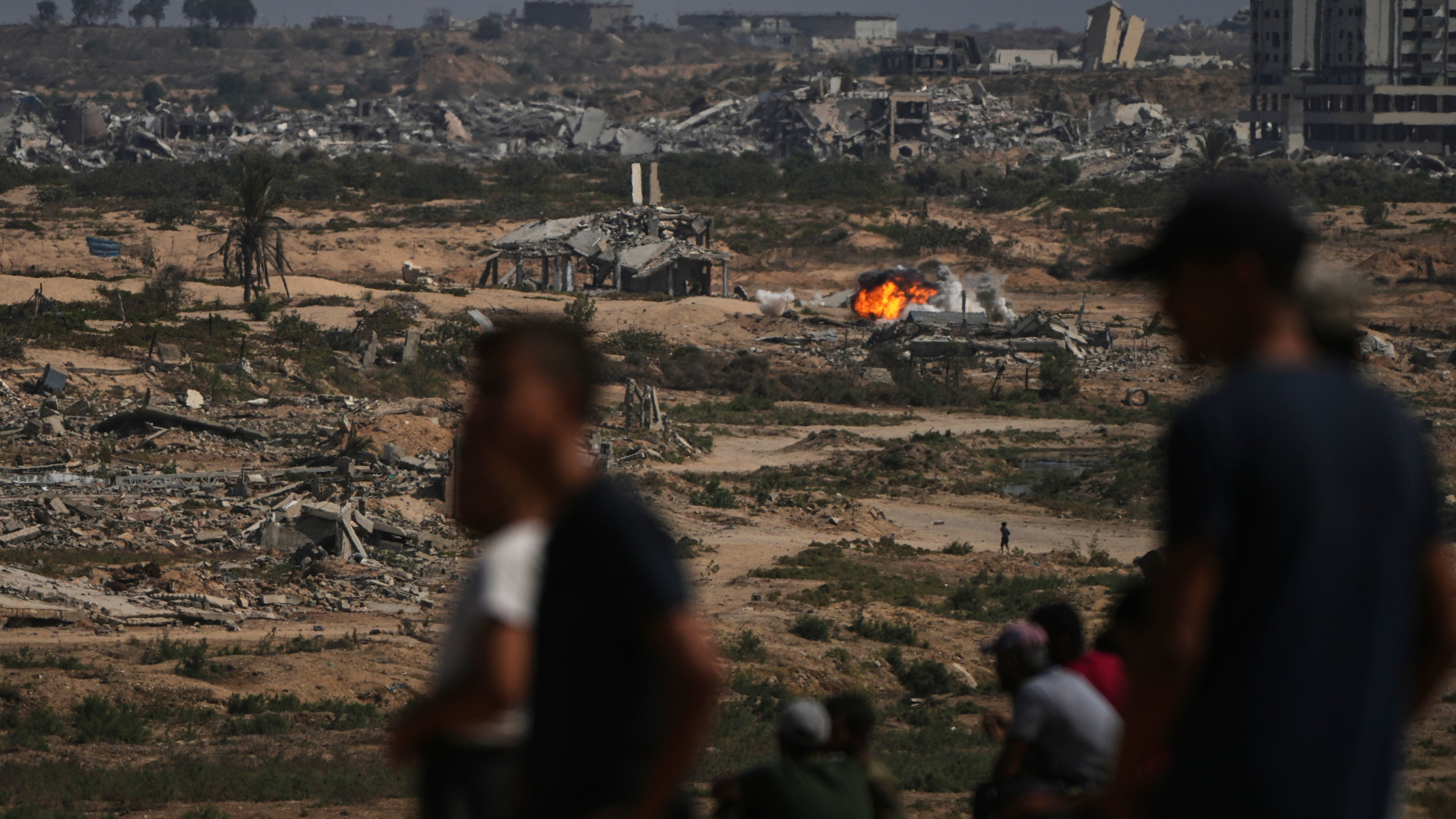 Fire and smoke rises following an Israeli army shelling in Nuseirat, central Gaza Strip, Saturday, Oct. 4, 2025.(AP Photo/Abdel Kareem Hana)