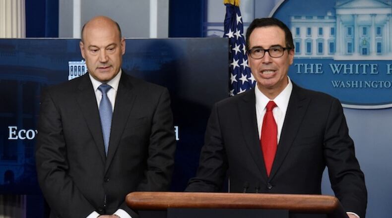 Treasury Secretary Steven Mnuchin, right, and Director of the National Economic Council Gary Cohn discuss the goals and feasibility of President Trump's tax reform plan in the Press Briefing Room of the White House Wednesday, April 26, 2017 in Washington, D.C. (Olivier Douliery/Abaca Press/TNS)