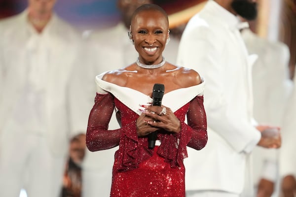 Host Cynthia Erivo, center, performs during the 78th Tony Awards on Sunday, June 8, 2025, at Radio City Music Hall in New York. (Photo by Charles Sykes/Invision/AP)