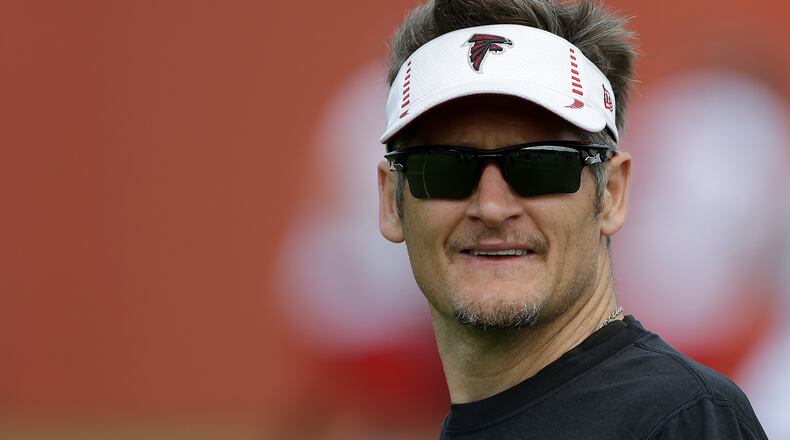 Atlanta Falcons general manager Thomas Dimitroff is shown during an NFL football practice in Flowery Branch, Ga., Tuesday, June 11, 2013. (AP Photo/John Bazemore) Thomas Dimitroff had a busy first day in NFL free agency. (AP photo)