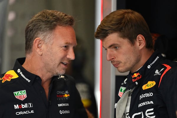 Red Bull team principal Christian Horner talkks to Red Bull driver Max Verstappen of the Netherlands before the third free practice at the Red Bull Ring racetrack, ahead of the Austrian Formula One Grand Prix in Spielberg, Austria, Saturday, June 28, 2025. (AP Photo/Denes Erdos)