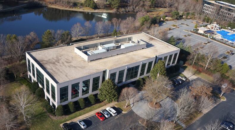 Johns Creek closed a $9.4 million deal in early 2017 to buy an existing building at 11360 Lakefield Drive in Technology Park to consolidate City Hall and fire, police and court functions. But it has had to negotiate an extension of its police department lease because occupancy in the new building is expected to be delayed at least a year. CITY OF JOHNS CREEK