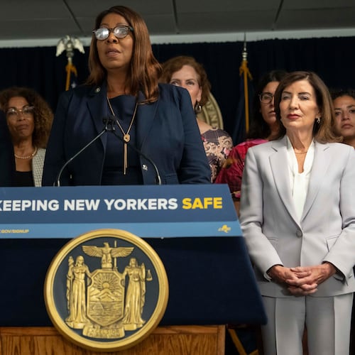 New York Attorney General Letitia James, flanked by New York Mayor Zohran Mamdani, left, and New York Governor Kathy Hochul, takes part in a press conference to announce action against ICE overreach in New York, Wednesday, Aug. 12, 2026. (AP Photo/Yuki Iwamura)