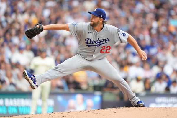 Los Angeles Dodgers' Clayton Kershaw pitches during the first inning of a baseball game against the Milwaukee Brewers, Tuesday, July 8, 2025, in Milwaukee. (AP Photo/Aaron Gash)