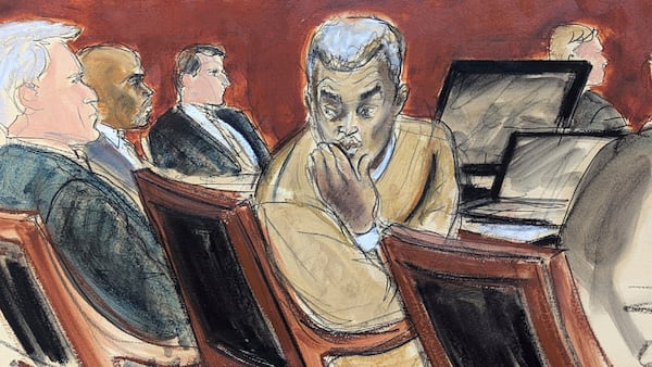 Sean "Diddy" Combs, right, blows kisses to people in the audience during his sex trafficking and racketeering trial in Manhattan federal court, Monday, May 19, 2025, in New York. (Elizabeth Williams via AP)