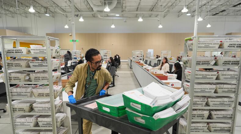 Ballots are sorted the day after California's primary election at the LA County Ballot Processing Center Wednesday, June 3, 2026, in City of Industry, Calif. (AP Photo/Jae C. Hong)