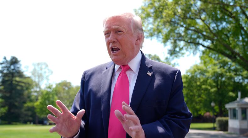 President Donald Trump speaks with reporters before departing on Marine One from the South Lawn of the White House, Thursday, April 16, 2026, in Washington. (AP Photo/Manuel Balce Ceneta)