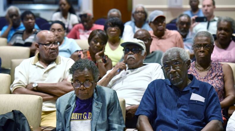 Fulton County residents listen to a presentation during an Emergency Town Hall Meeting earlier this month.