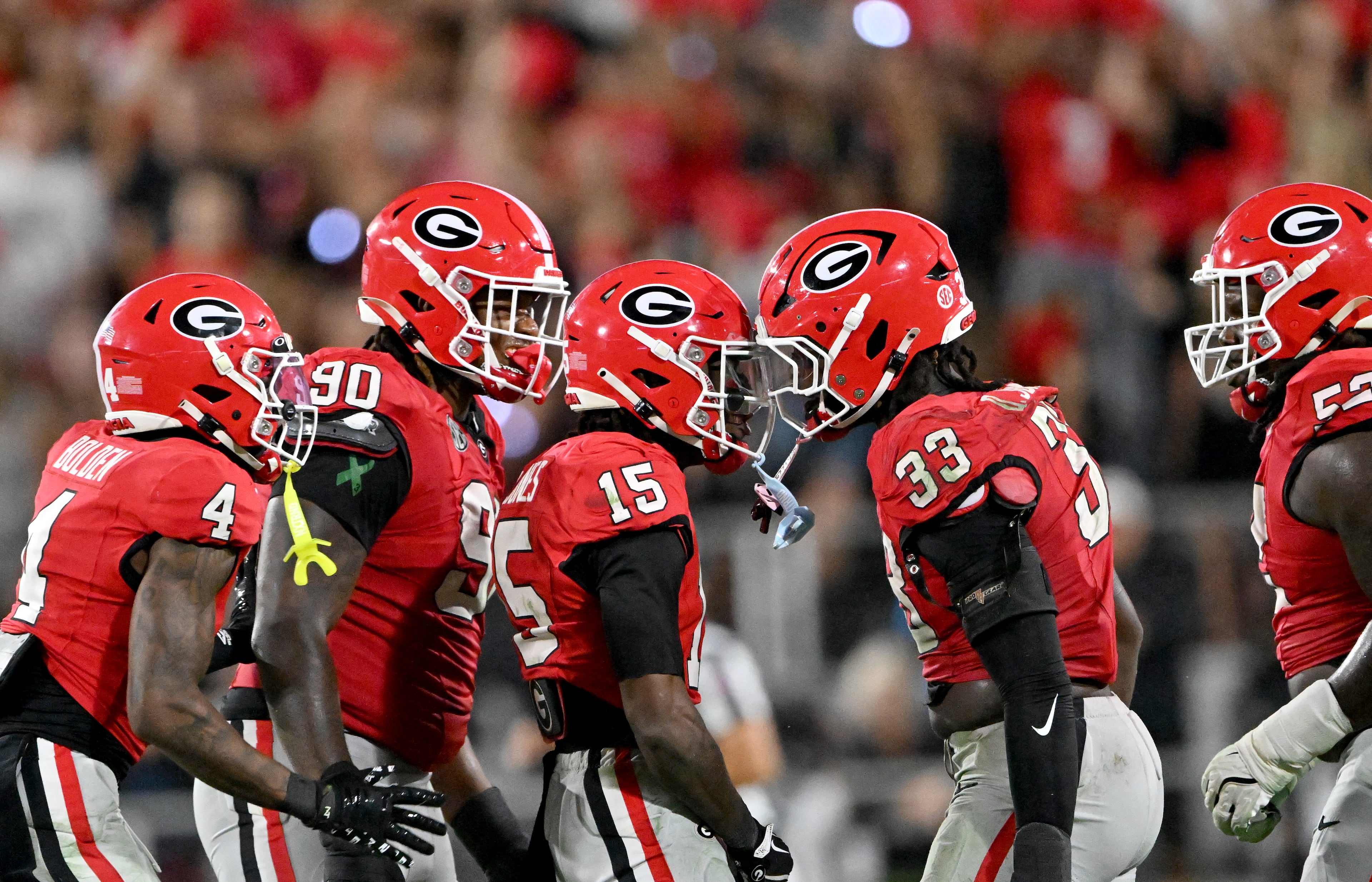 Georgia linebacker Quintavius Johnson (33) celebrates with teammates after sacking Alabama quarterback Ty Simpson during the second half in an NCAA football game at Sanford Stadium, Saturday, September 27, 2025, in Athens. Alabama won 24-21 over Georgia. (Hyosub Shin / AJC)