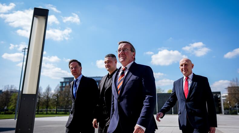 From left, Secretary General of NATO Mark Rutte, Ukraine's Minister of Defense Mykhailo Fedorov, Germany's Minister of Defense Boris Pistorius and Britain's Secretary of Defense John Healey meet at the Ukraine Contact Group meeting in front of the Federal Ministry of Defense in Berlin, Wednesday April 15, 2026. (Kay Nietfeld/dpa via AP)