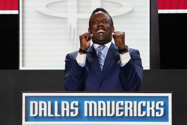 Dallas Mavericks' Rolando Blackman celebrates after NBA Deputy Commissioner Mark Tatum announced that the Mavericks won the first pick in the NBA basketball draft lottery in Chicago, Monday, May 12, 2025. (AP Photo/Nam Y. Huh)