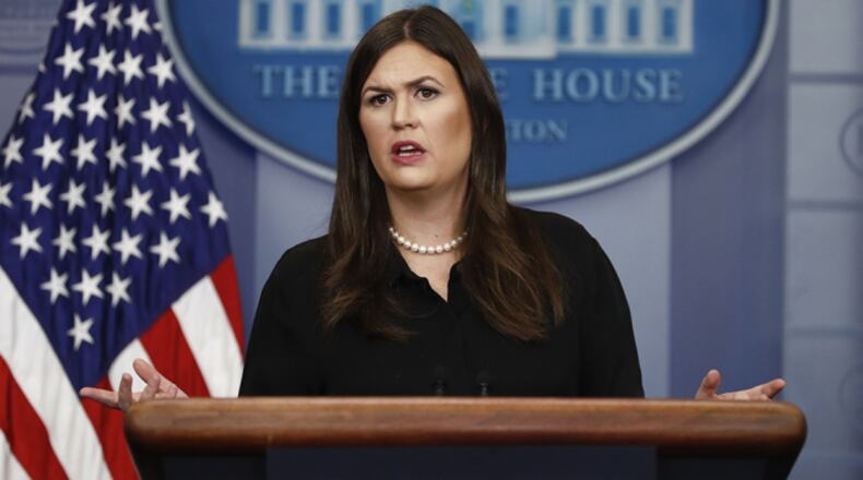 Mandatory Credit: Photo by AP/REX/Shutterstock (9057944a) White House press secretary Sarah Huckabee Sanders speaks during a news briefing at the White House, in Washington, . Huckabee Sanders discussed tax reform, President Donald Trump's planned dinner tonight with House and Senate minority leaders, and other topics Trump, Washington, USA - 13 Sep 2017
