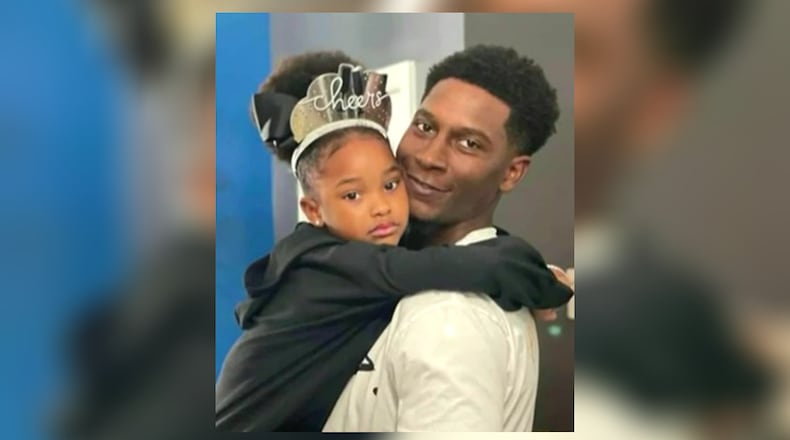 Bradley Coleman with his daughter.