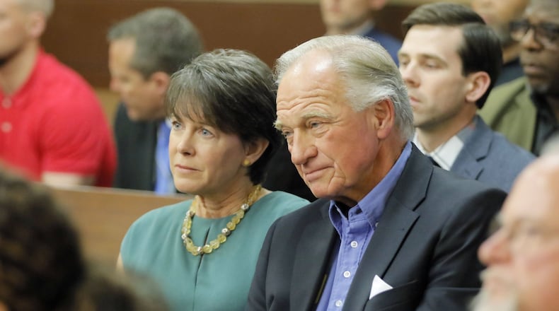 Waffle House chairman Joe Rogers Jr. (right), and his wife, Fran, react to the verdicts in Fulton County Superior Court on Wednesday, April 11, 2018. Jurors decided that a sex video involving Rogers was not recorded illegally and acquitted all three defendants. (Bob Andres bandres@ajc.com)