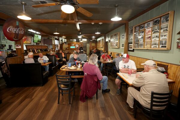 Customers eat lunch at Doug’s Place, a meat and three restaurant, on Old Allatoona Road, Thursday, November 3, 2022, in Emerson, Ga. (Jason Getz / Jason.Getz@ajc.com)