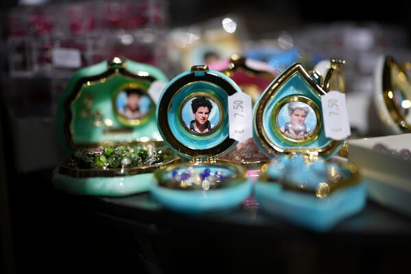 Souvenirs of Carlo Acutis, the 15-year-old Italian boy who died in 2006 of leukemia and beatified in 2020, are displayed in a shop in Assisi, Italy, Wednesday, April 2, 2025. (AP Photo/Alessandra Tarantino)