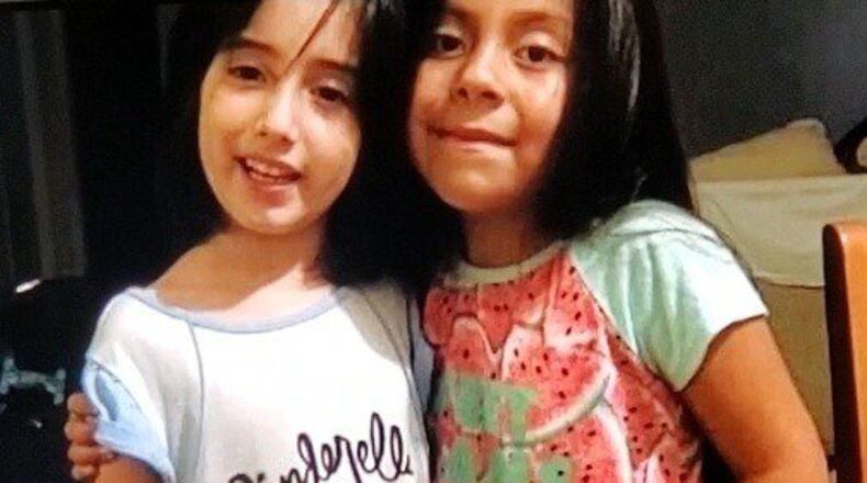 Two Forsyth County sisters who suffered serious injuries when they were struck by a car at their bus stop last week have been released from the hospital.