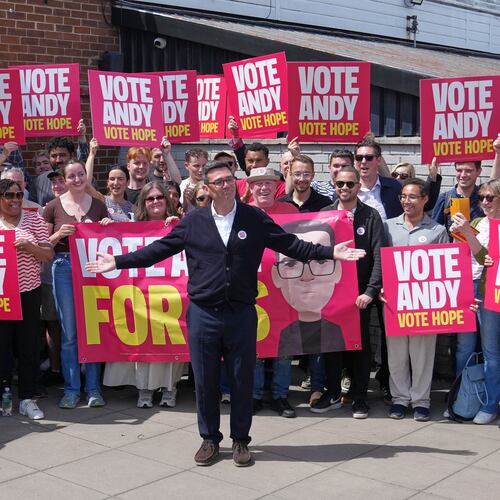 Britain's Labour candidate Andy Burnham stands in front of supporters during the by-election in Makerfield, England, Thursday, June 18, 2026 where voters are choosing a new lawmaker with Andy Burnham of the Labour Party as the leading contender.(AP Photo/Jon Super)