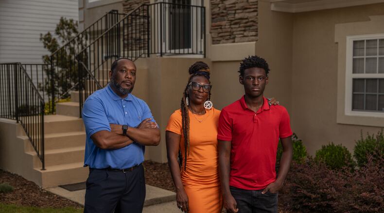Toi Cliatt, Trina Martin and her son, Gabe Watson, say they were traumatized when an FBI SWAT team raided their Atlanta home by mistake in 2017. (Courtesy Institute for Justice)