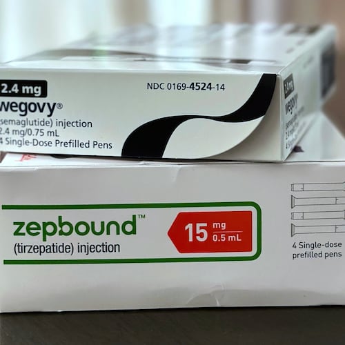 FILE - Boxes for the medications Wegovy and Zepbound are arranged for a photograph in California on May 8, 2025. (AP Photo/JoNel Aleccia, File)