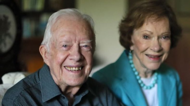 Jimmy and Rosalynn Carter in his office at the Carter Center in Atlanta, in a photo from July 2016. BOB ANDRES / BANDRES@AJC.COM