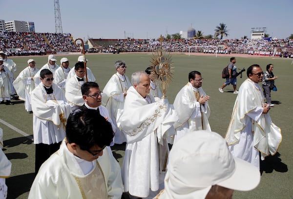 FILE - Pope Leo XIV, then Apostolic Administrator of Chiclayo Robert Prevost, attends a Corpus Christi celebration at a stadium in Chiclayo, Peru, Friday, June 19, 2015. (AP Photo/Julio Reano, File)