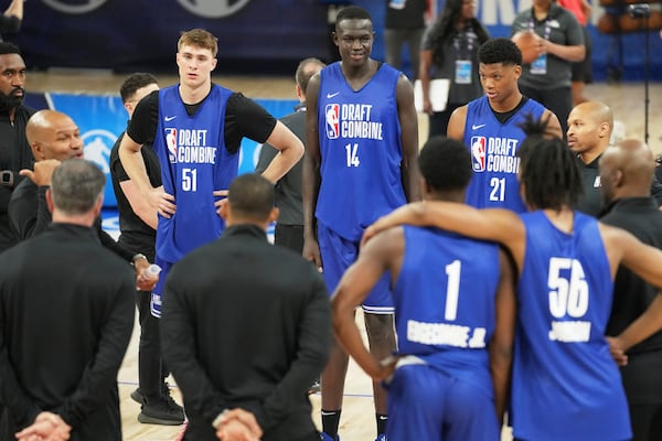 Cooper Flagg (51), Khaman Maluach (14) and Ace Bailey (21) participate at the 2025 NBA basketball Draft Combine in Chicago, Tuesday, May 13, 2025. (AP Photo/Nam Y. Huh)