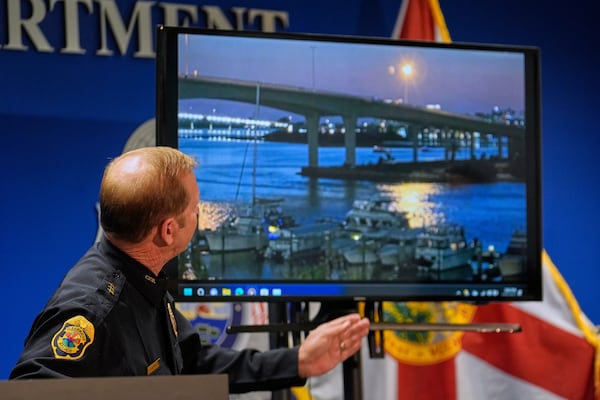 Clearwater, Fla., Police Chief Eric Gandy shows the media a boat crash video that occurred on Sunday night during a news conference Monday, April 28, 2025, in Clearwater, Fla. (AP Photo/Chris O'Meara)