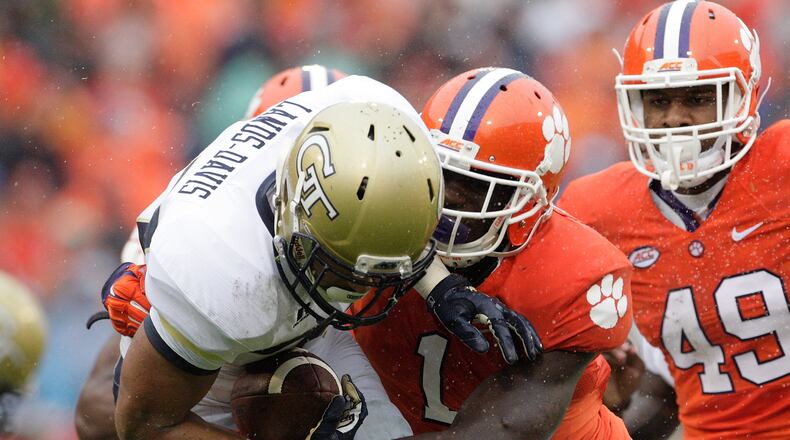 CLEMSON, SC - OCTOBER 10: Mikell Lands-Davis #37 of the Georgia Tech Yellow Jackets is tackled by Jayron Kearse #1 of the Clemson Tigers during their game at Memorial Stadium on October 10, 2015 in Clemson, South Carolina. (Photo by Tyler Smith/Getty Images)