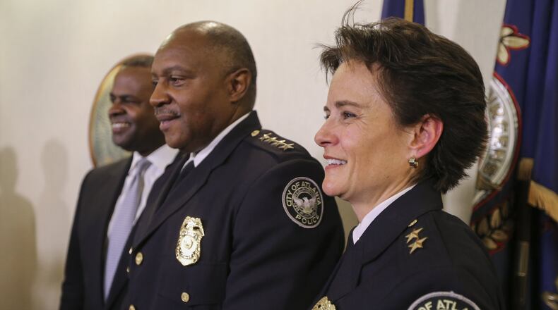 Left to right - Mayor Kasim Reed, APD Chief George Turner and APD Deputy Chief Erika Shields at a city hall press conference Thursday Shields was named Atlanta’s 24th chief of police Thursday, replacing George Turner who is retiring. JOHN SPINK /JSPINK@AJC.COM