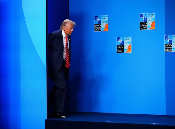 U.S. President Donald Trump arrives to be officially greeted by NATO Secretary General Mark Rutte and Netherland's Prime Minister Dick Schoof at the NATO Summit in The Hauge, Netherlands on Wednesday, June 25, 2025. (Sean Kilpatrick/The Canadian Press via AP)