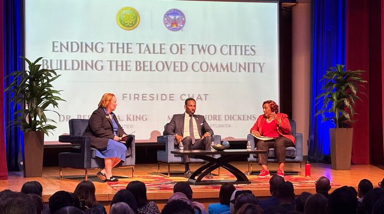 Atlanta Mayor Andre Dickens (center) speaks with Bernice King (right) and Melita Easters about his Neighborhood Reinvestment Initiative at the King Center in Atlanta earlier this month. (Shaddi Abusaid/AJC)