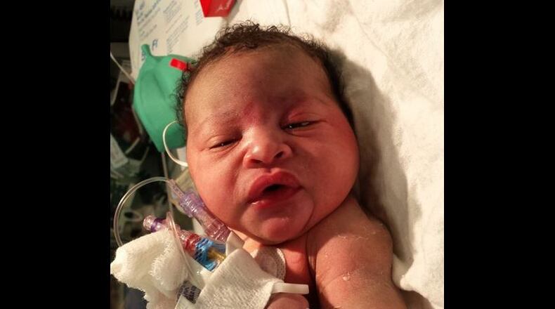 Authorities continued Wednesday to search for the mother of “Baby Harlan,” who was found Monday evening on the front porch of a southwest Atlanta home. (Credit: Channel 2 Action News)