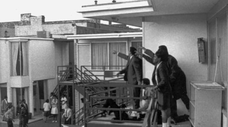 This 1968 file photo was taken minutes after an assassin's bullet struck Dr. Martin Luther King Jr. at the Lorraine Motel in Memphis, Tenn., on April 4, 1968. Photographed by Joseph Louw, Jesse Jackson and Andrew Young stand over King's body as they point out to police where they heard the shot.