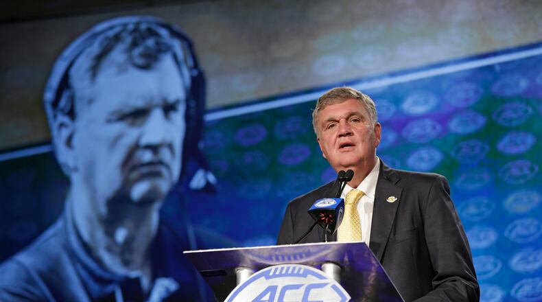 Paul Johnson addresses Georgia Tech's prospects Friday at the very upbeat ACC Football Kickoff. (AP Photo/Chuck Burton)