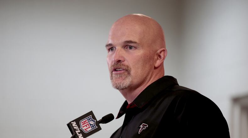 Atlanta Falcons head coach Dan Quinn speaks after an NFL football game against the Denver Broncos, Sunday, Oct. 9, 2016, in Denver. The Falcons won 23-16. (AP Photo/Joe Mahoney)