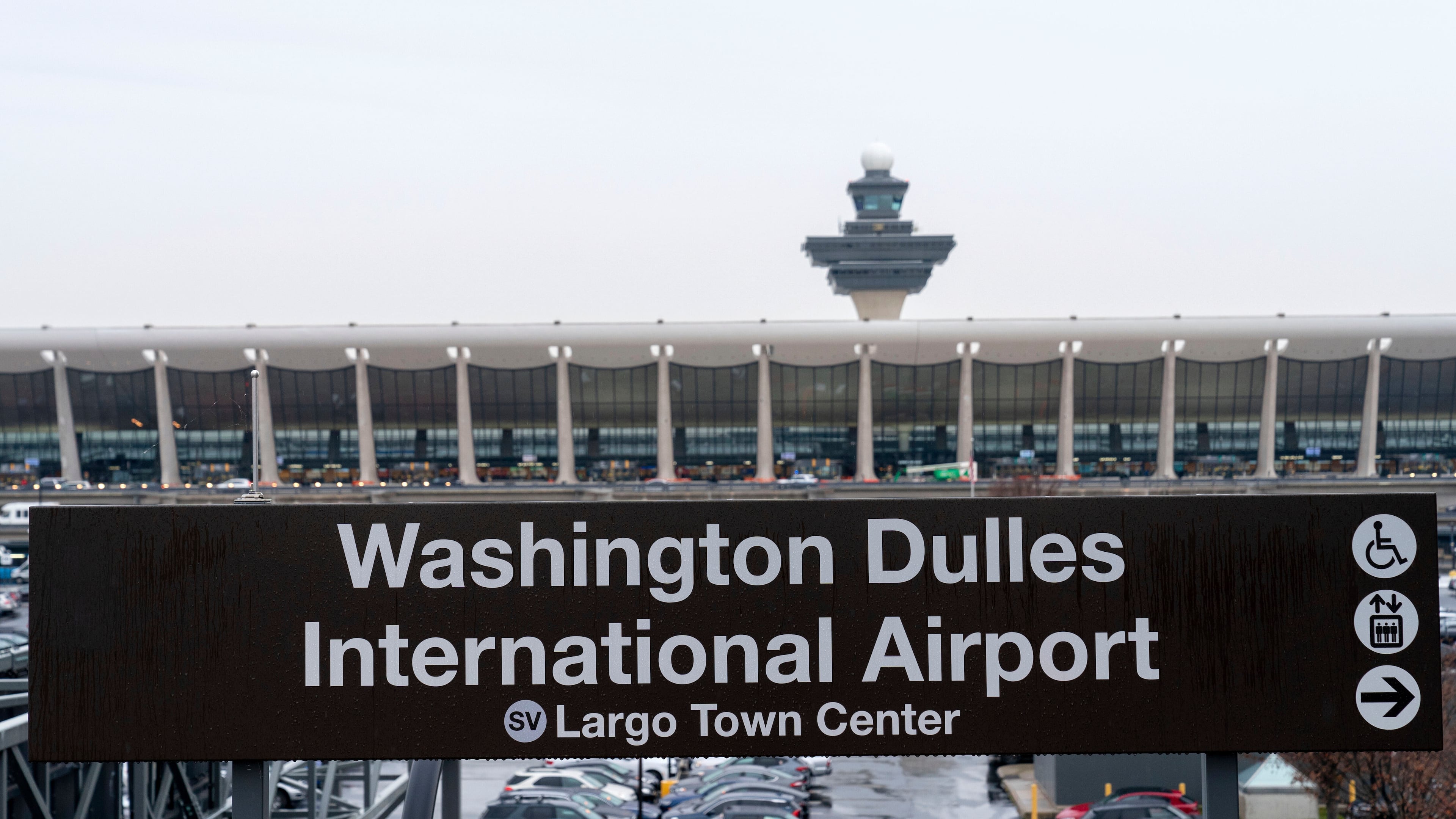 FILE - A sign of Washington Dulles International Airport station is seen during the opening of new Silver Line Extension at Washington Dulles International Airport, in Chantilly, Va., Nov. 15, 2022. (AP Photo/Jose Luis Magana, File)