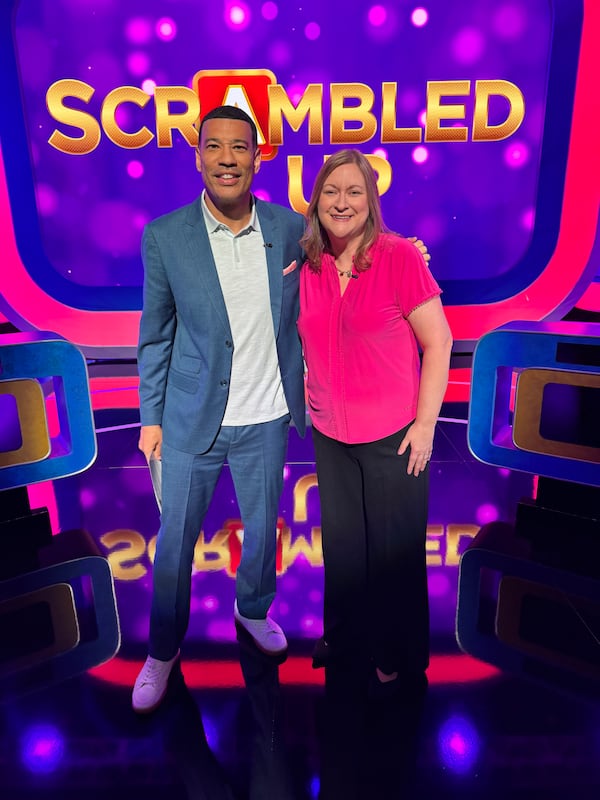Julie Plinto, a teacher who lives in Powder Springs, appears on the new syndicated game show “Scrambled Up.” The show shot 160 episodes this summer at Electric Owl Studios in Atlanta. (Rodney Ho/AJC)