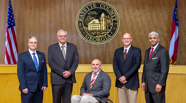 Charles Oddo and Randy Ognio (far left) will serve second terms as vice chairman and chairman, respectively, of the Fayette County Board of Commissioners. Courtesy Fayette County