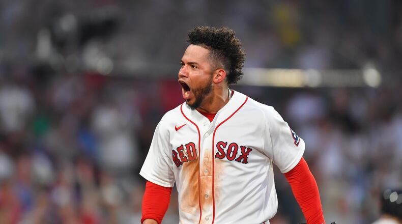 Boston Red Sox's Willson Contreras celebrates after scoring on a two-run single by Caleb Durbin in the fourth inning of a baseball game against the New York Yankees, Sunday, June 28, 2026, in Boston. (AP Photo/Steven Senne)
